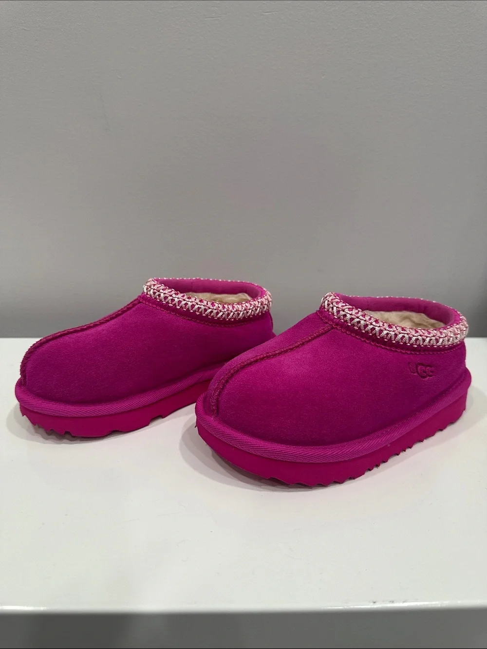 UGG Kids Slip-On Slippers in Fuchsia with Embroidered Trim
